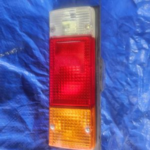 Toyota genuine Landcruiser Ute TAIL LIGHT. 75 & 79 series, complete, style side tubs, 81550-60451 (square plug) new
